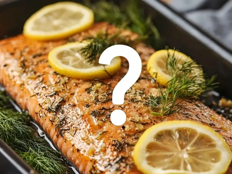 Baked steelhead trout fillet with dill and lemon slices, overlaid with a question mark.